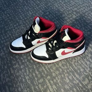 Used Black, Red, and White Nike Air Jordan’s Size 6.5